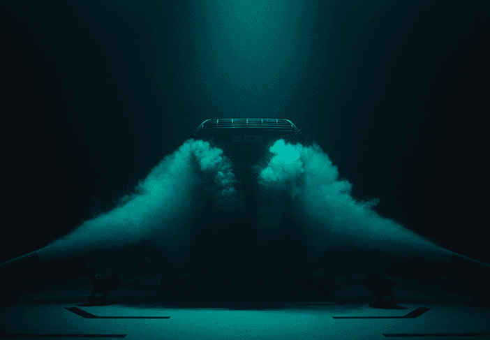 Trane cooling unit is standing in a cloud of blue steam.