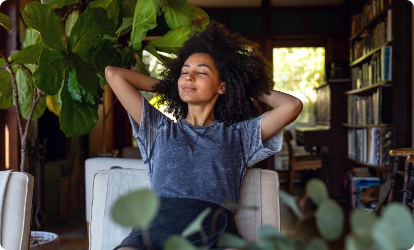 A woman relaxing breathing in fresh air.