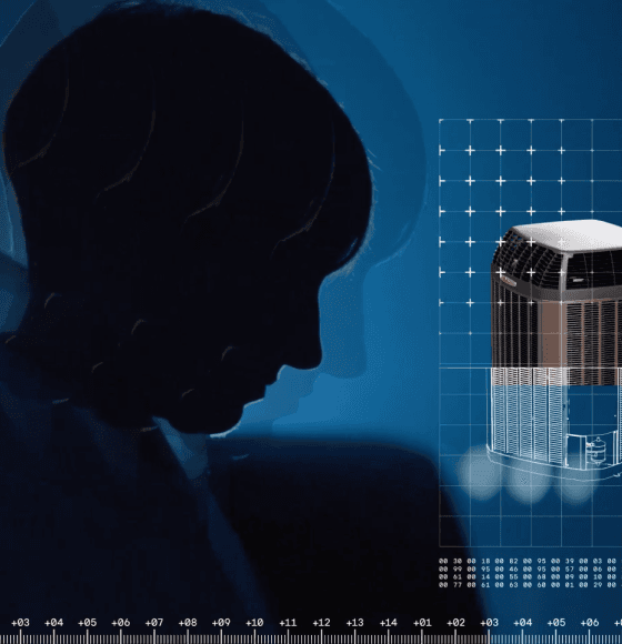 A specialist tests a Trane single-stage air unit.