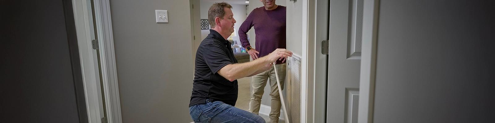 HVAC Technician Changing an Air Filter