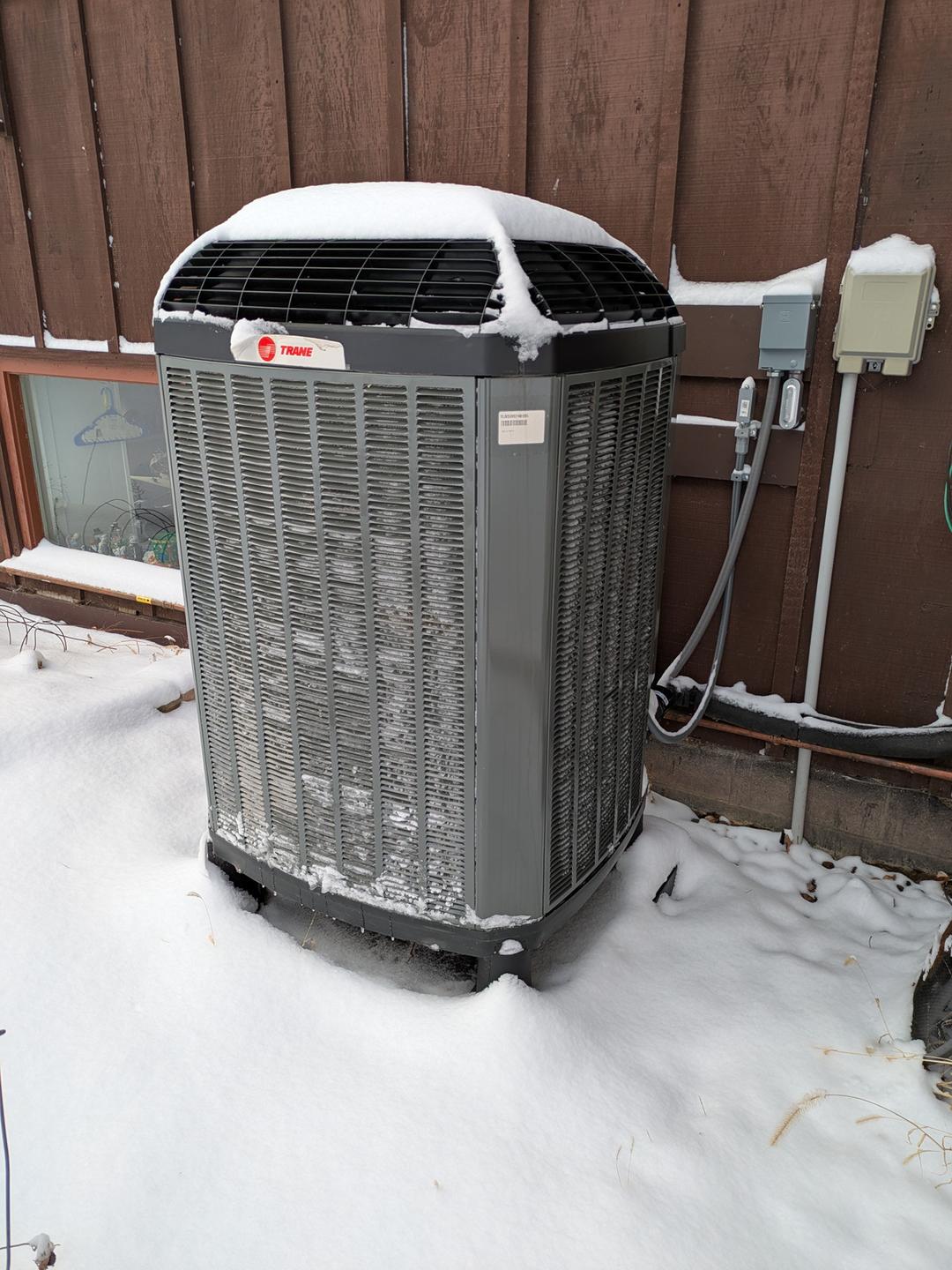 Trane Cold Climate Heat Pump in the Snow