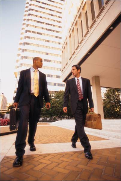 Businessmen walking on street