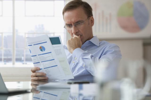 Businessman reading report