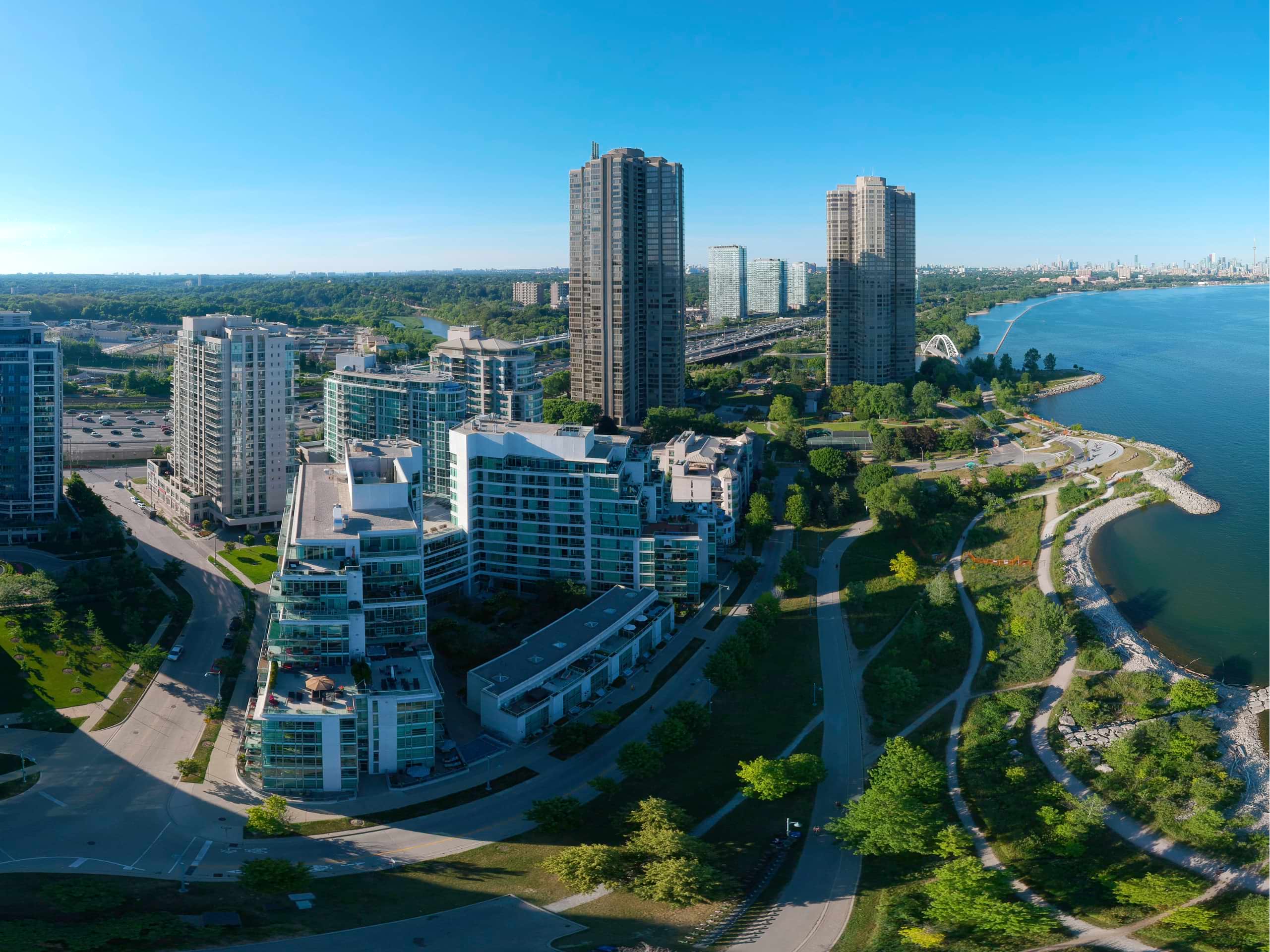 Sprawling city skyline with greenery