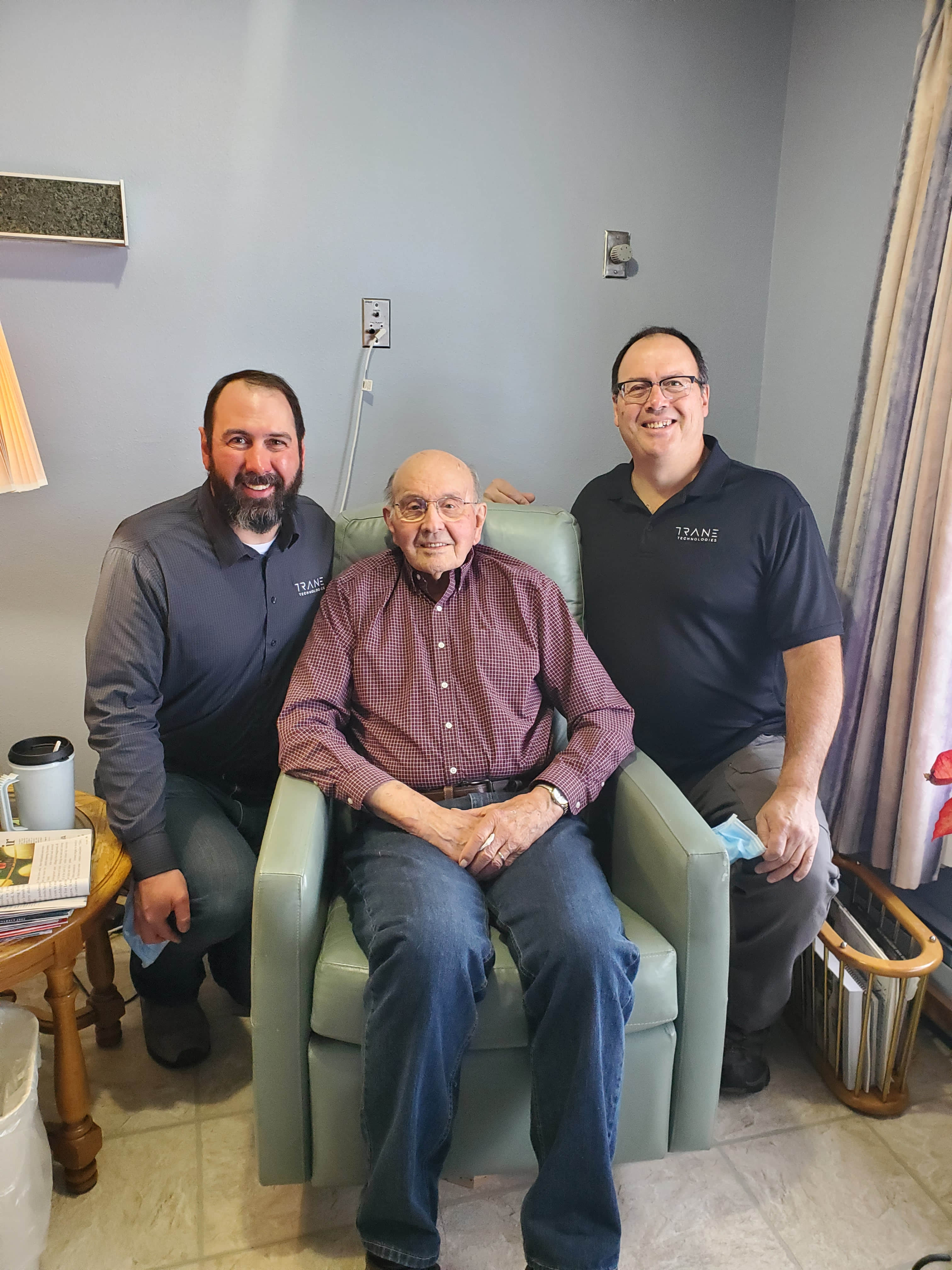 From left to right: Joe Fiegen, product development engineer, with his late grandfather, Don, retired manufacturing engineer, and his father, Greg Fiegen, retired manufacturing engineer.