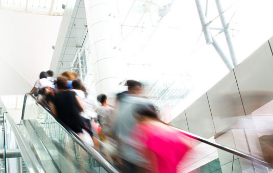 People on escalator