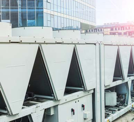 air conditioner outside machine with building background